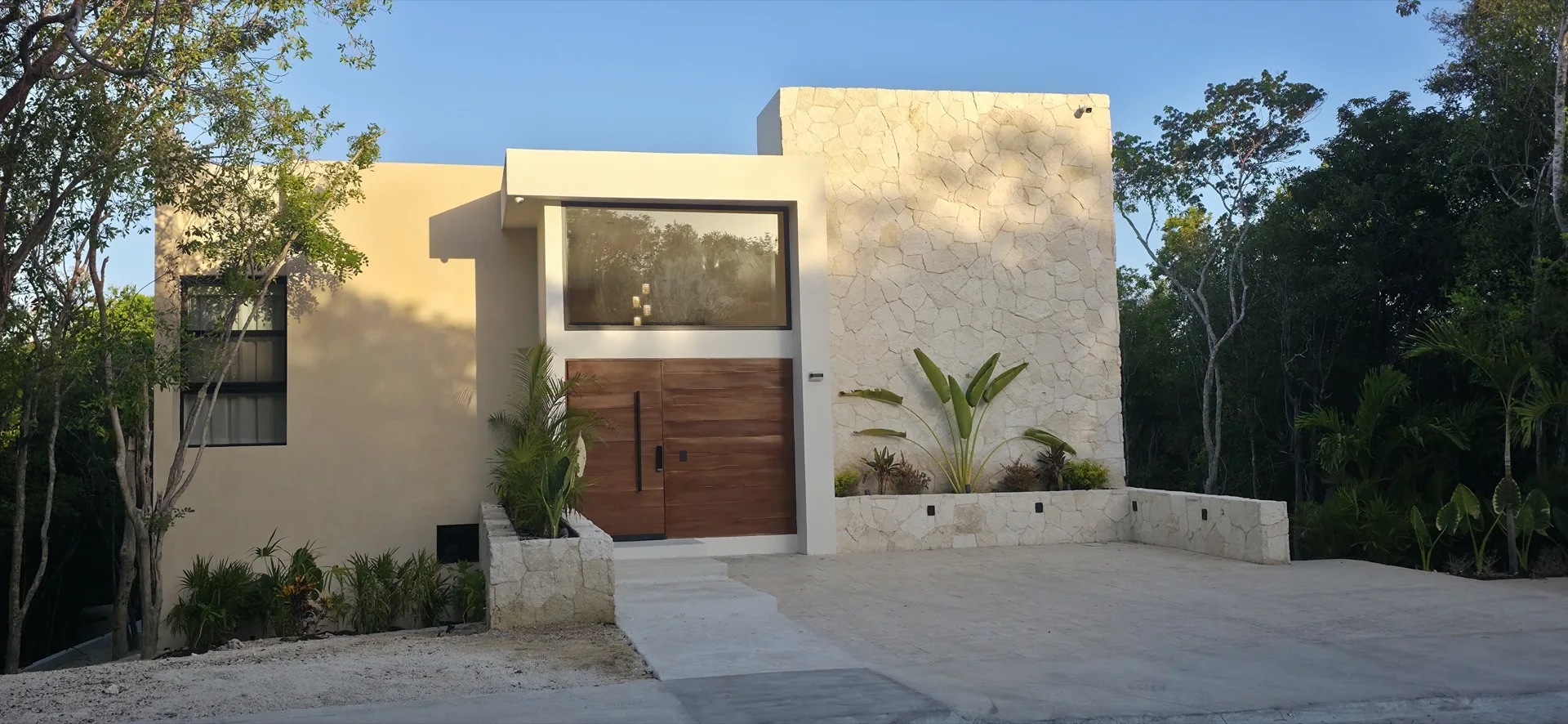 Stone and Tzalam entrance to Casa Arroyo Blanco